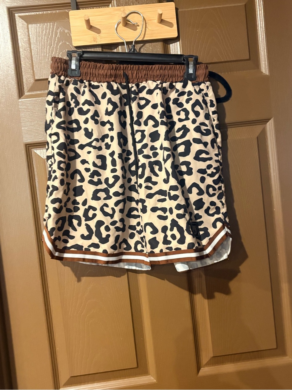 SHEIN Beige and Black Leopard Print Athletic Shorts with Brown Trim
